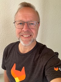 A selfie of Mattias Söderberg, Solutions Architect Nordics Region at GitLab, wearing a dark grey t-shirt with an orange GitLab logo.